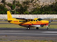 sxm/low/N940HL - Cessna 208B Grand Caravan DHL - SXM 02-02-2017.jpg